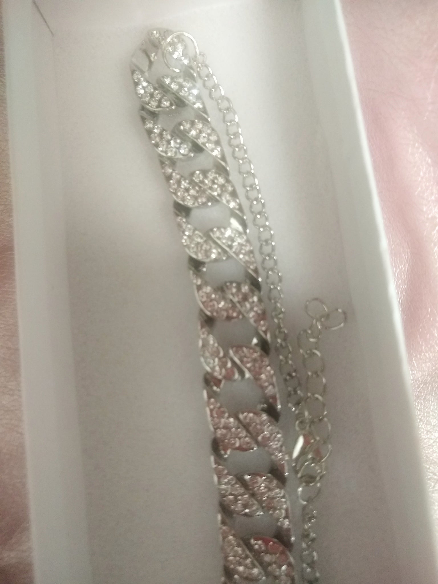 Women's rhinestone Cuban Link necklace.