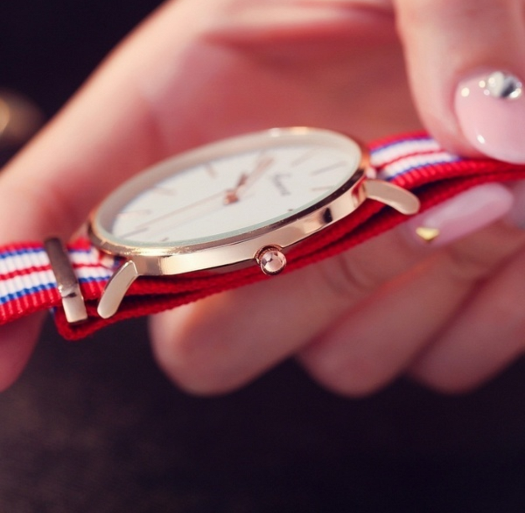 Vibrant red, white & thin blue striped watch, trimmed in rose gold tone. Fabulous.