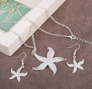 Lovely silver tone starfish necklace and earrings set