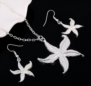 Lovely silver tone starfish necklace and earrings set