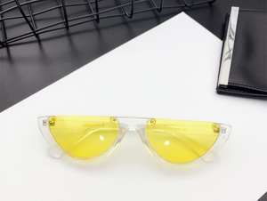 White frame, fun in the sun, low ride sunglasses with yellow lens