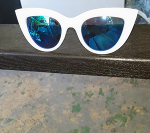 White lens cat eye sunglasses with electric blue mirror lens