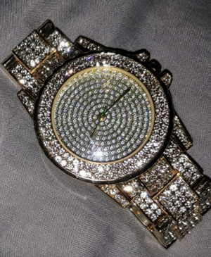 Bling On Another Level, gold tone rhinestone watch.