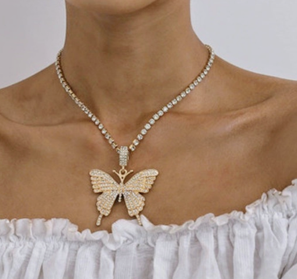 Beautiful large bling butterfly necklace in gold tone. Rhinestone chain included.