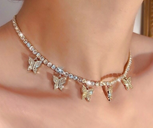 Beautiful rhinestone butterfly choker necklace in gold tone