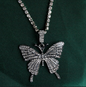 "Smokey Eye"  Beautiful large bling butterfly necklace in dark gray tone. Rhinestone chain included.