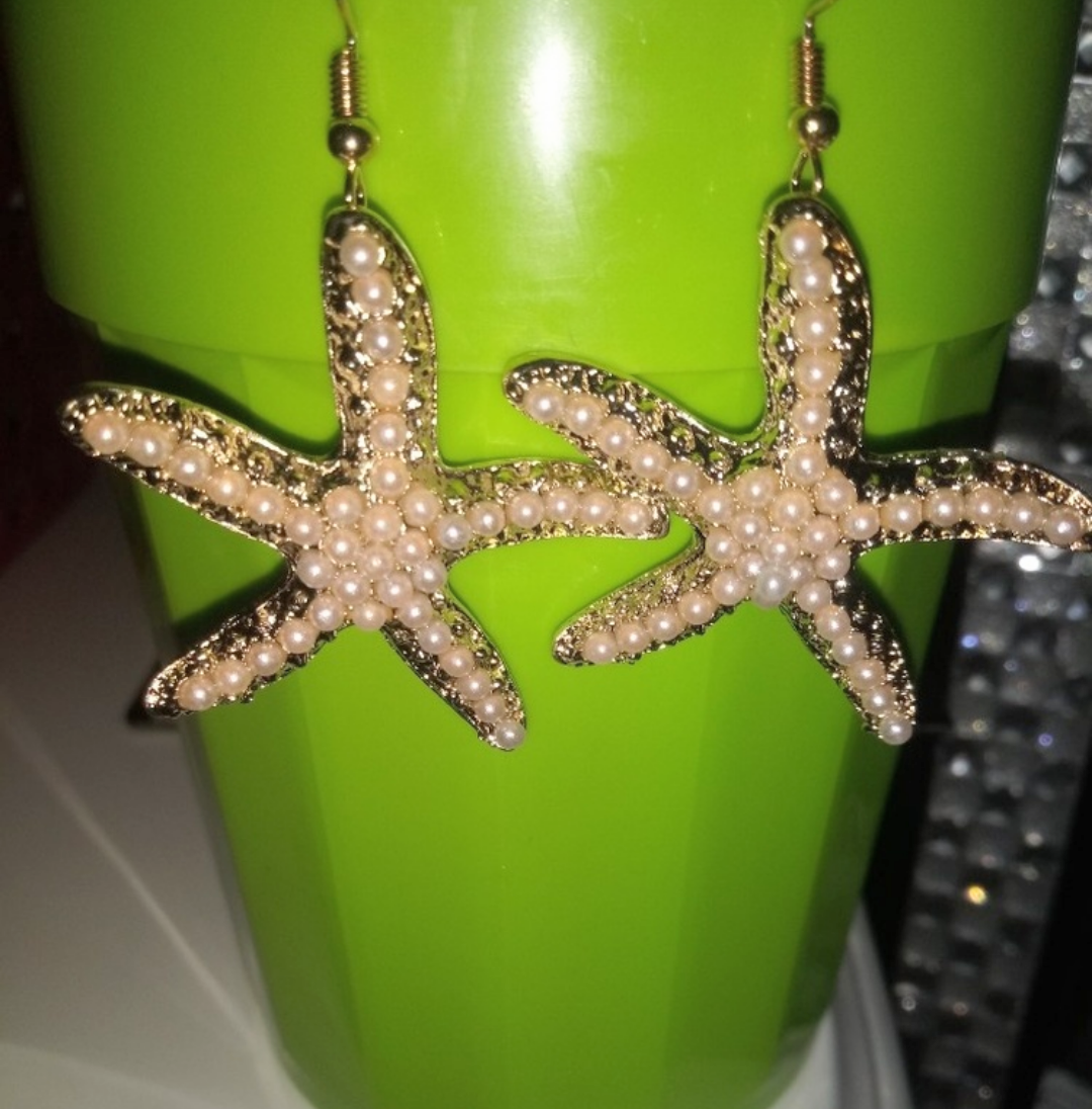 Lovely gold tone pearl dangle starfish earrings