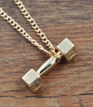 "Work It Out" gold tone dumbbell necklace