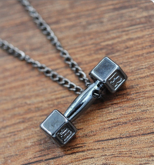 "Work It Out" black tone dumbbell necklace