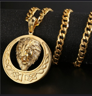 Gold tone Lions head necklace on link chain