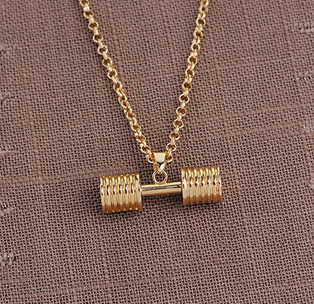 "Gym Head" glossy gold tone dumbbell necklace