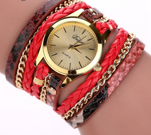 Red Snakeskin patterned, gold chain wrap-around watch.