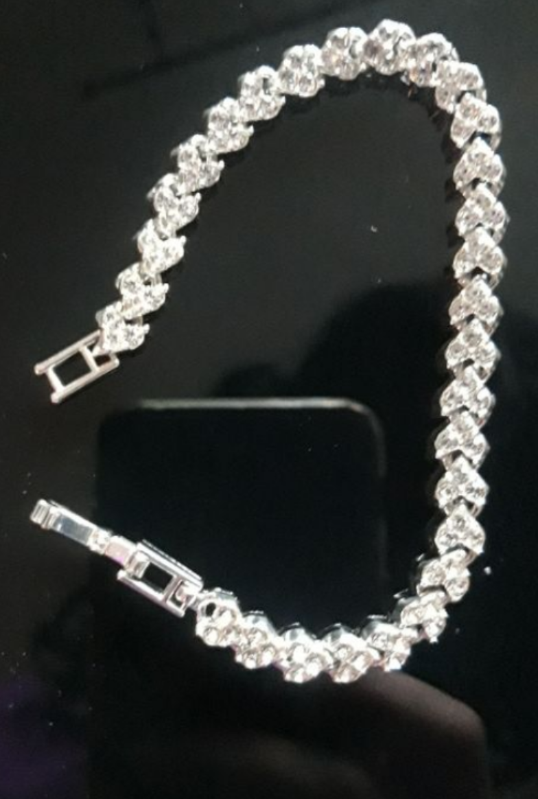 The "I Love You" heart-shaped tennis bracelet.