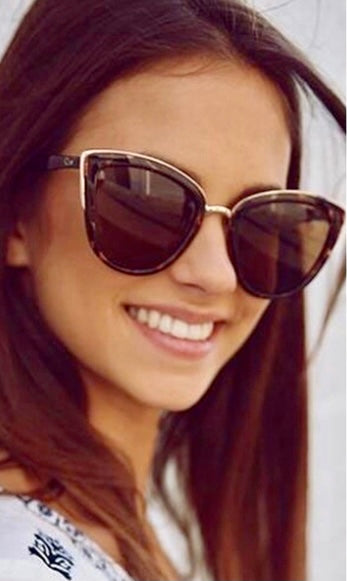 Tortoise oversized cat eye sunglasses. Gold tone accents