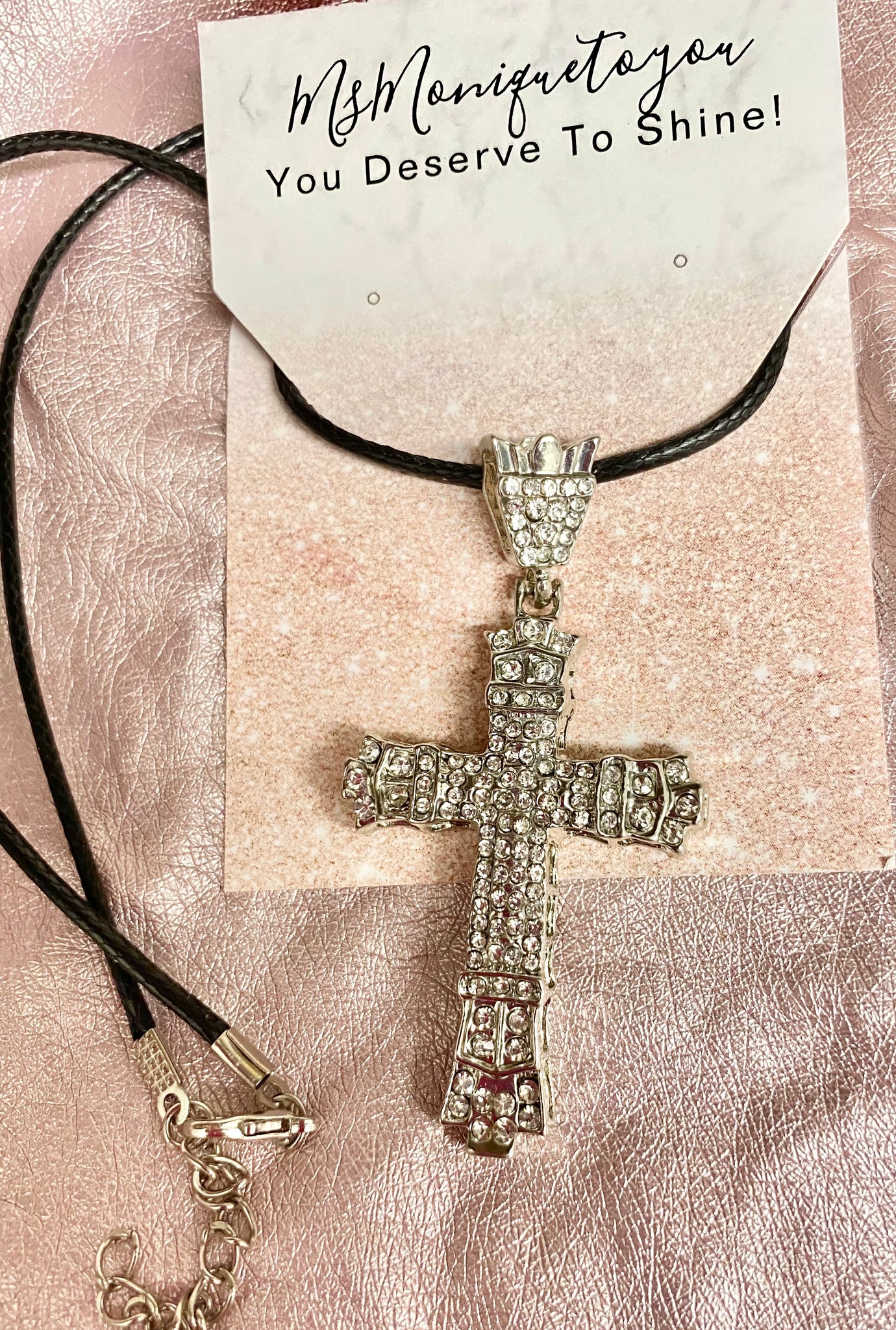 Shine Bright Like A Diamond cross necklace. Silver tone.