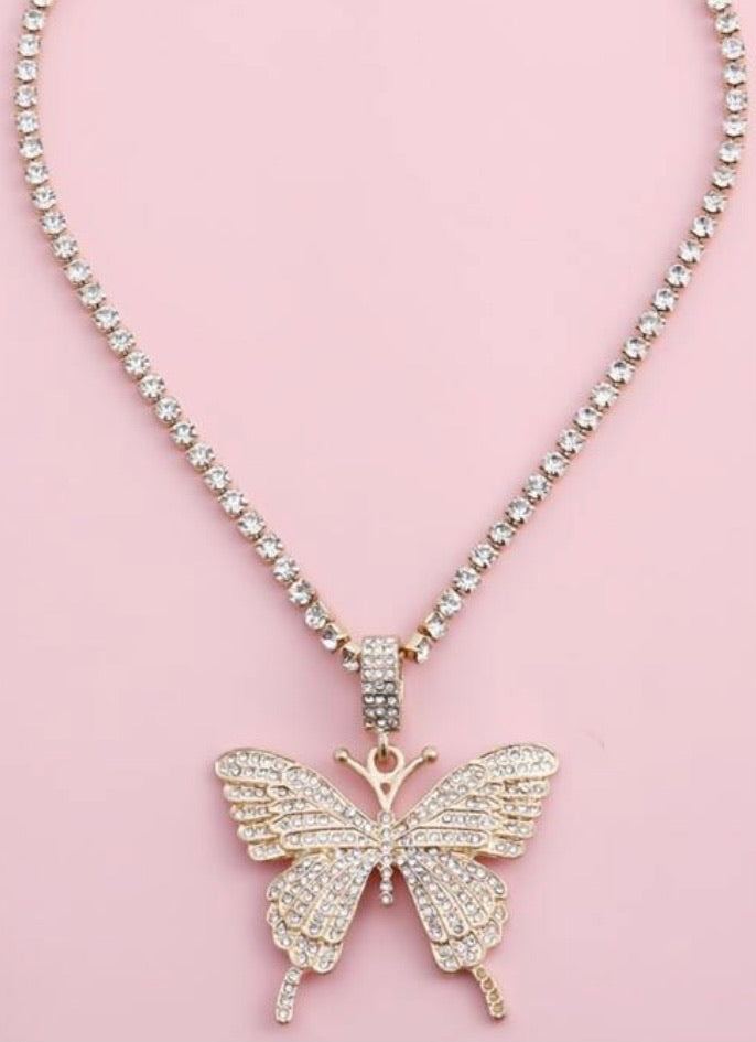 Beautiful large bling butterfly necklace in gold tone. Rhinestone chain included.