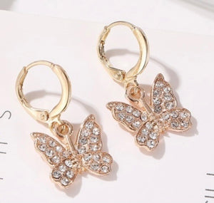 Dainty dangling crystal butterfly earrings in gold tone