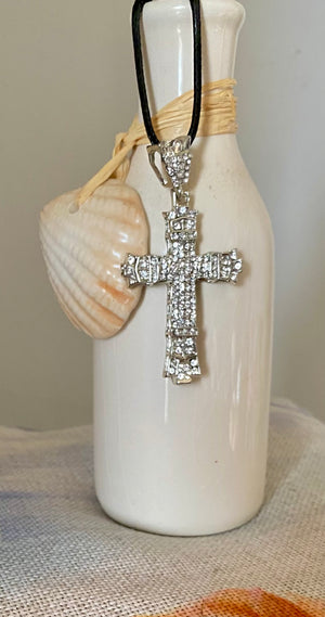 Shine Bright Like A Diamond cross necklace. Silver tone.