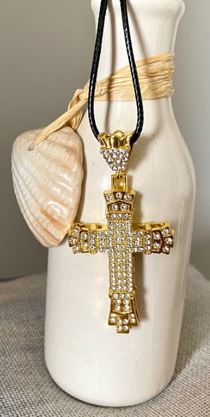 Shine Bright Like A Diamond cross necklace. Gold tone.