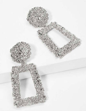 Geometric, trapezoidal Silver tone textured earrings.