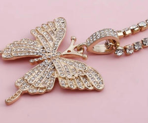 Beautiful large bling butterfly necklace in gold tone. Rhinestone chain included.